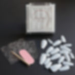 box with white coffin press on nails and applicators