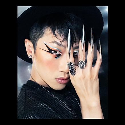 Model with futuristic spiked press-on nails