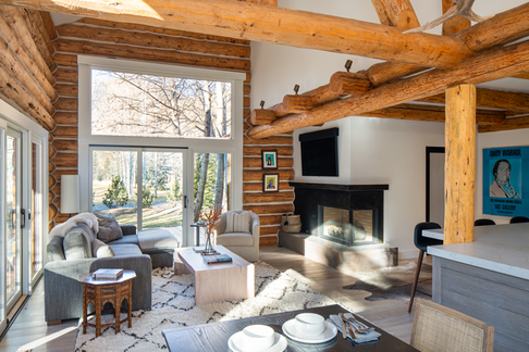 Laura Morawitz Interior Design, Ketchum, Idaho. log cabin remodel, exposed beams, living room