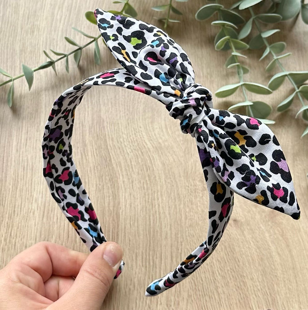 Thumbnail: Rainbow Leopard Knot Bow Headband