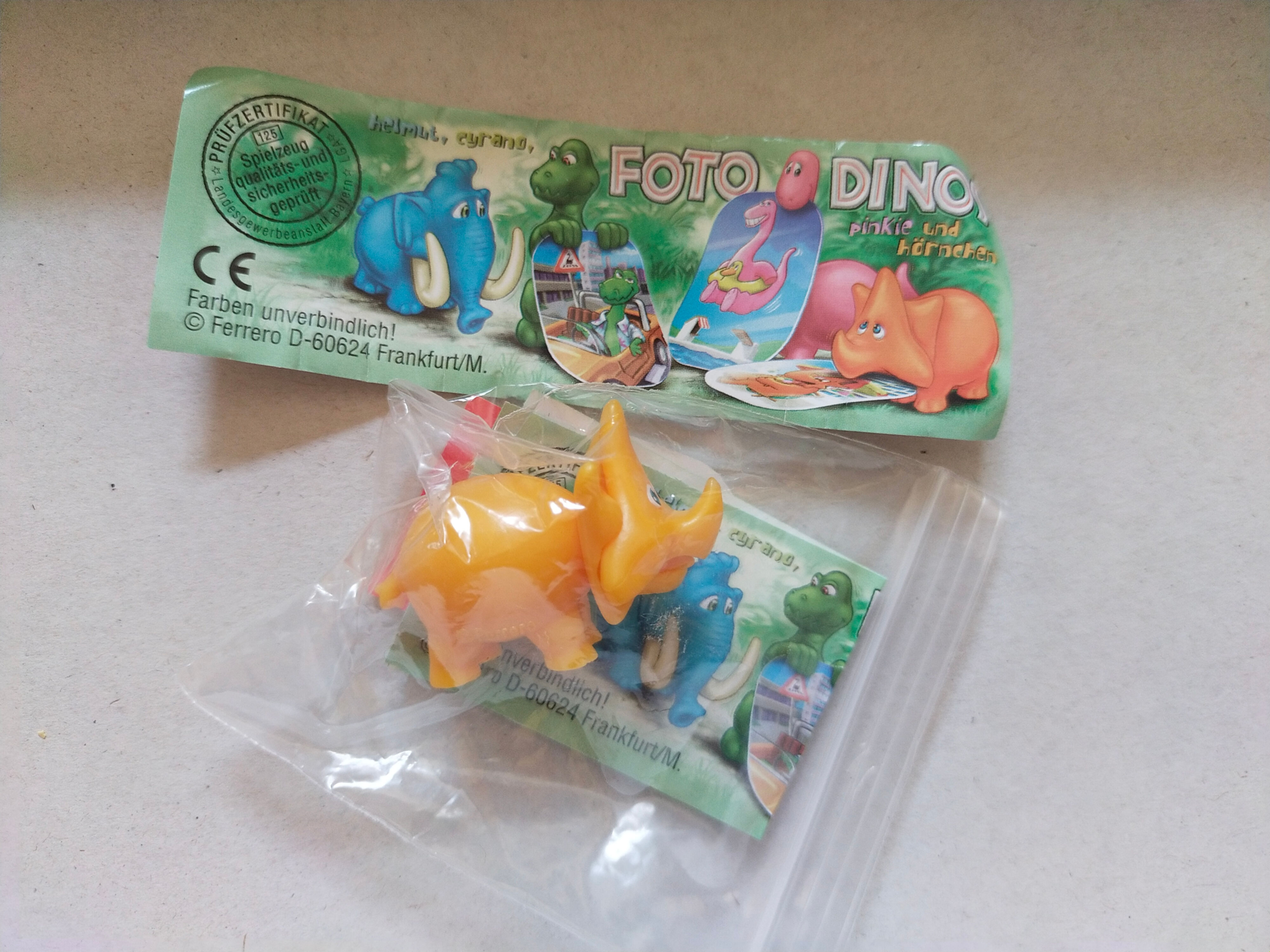 Žlutá a modrá kovová hračka FOTODINO