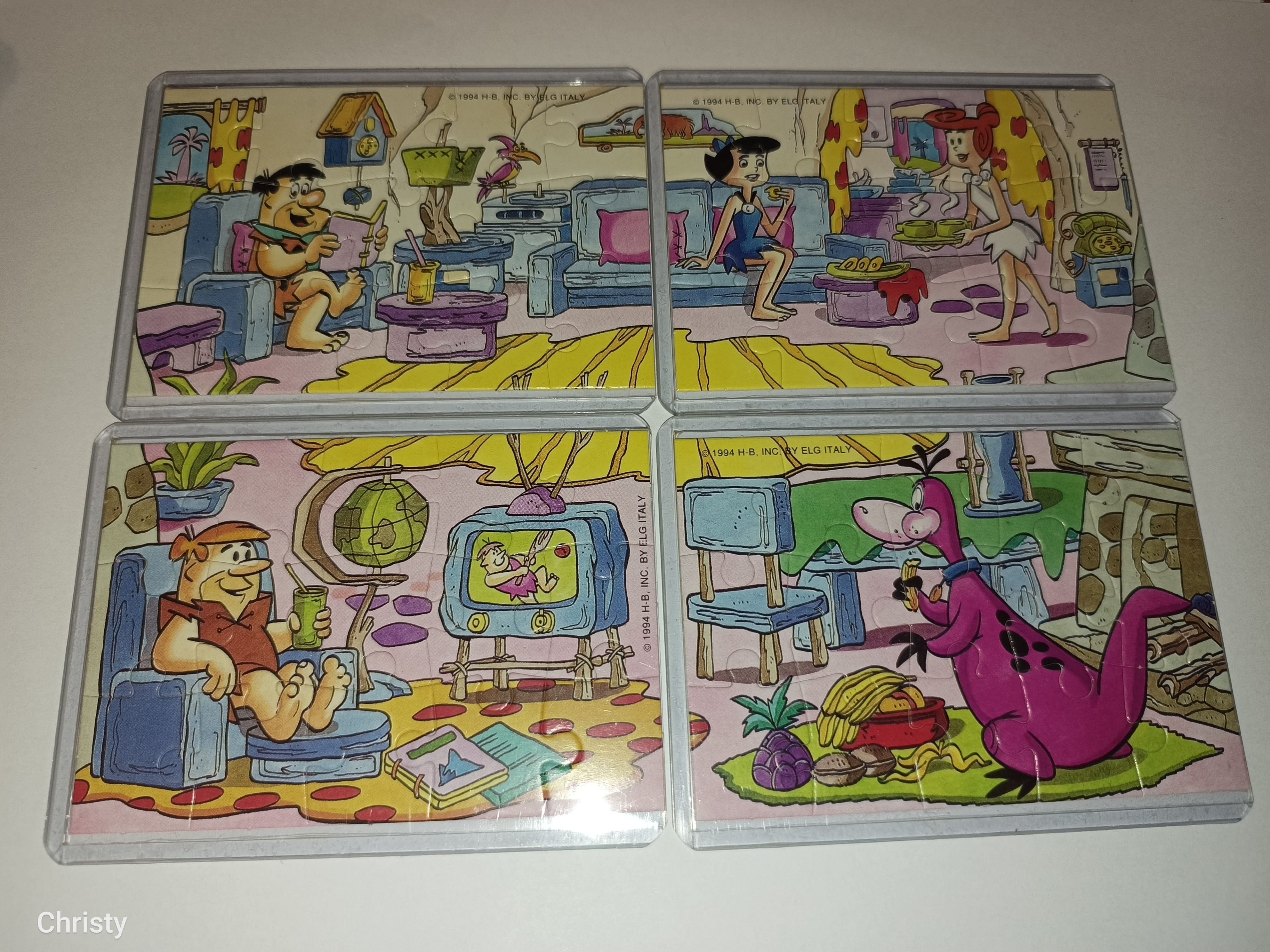 Obrázek čtyř scén s Flintstonovými