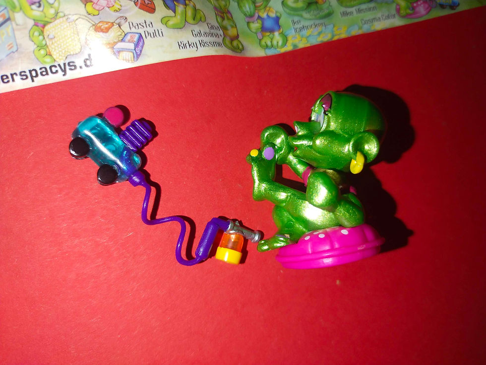 Zelený drak s malým vozítkem