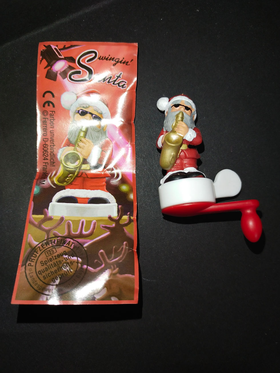 Vánoční hračka: Santa Claus s saxofonem