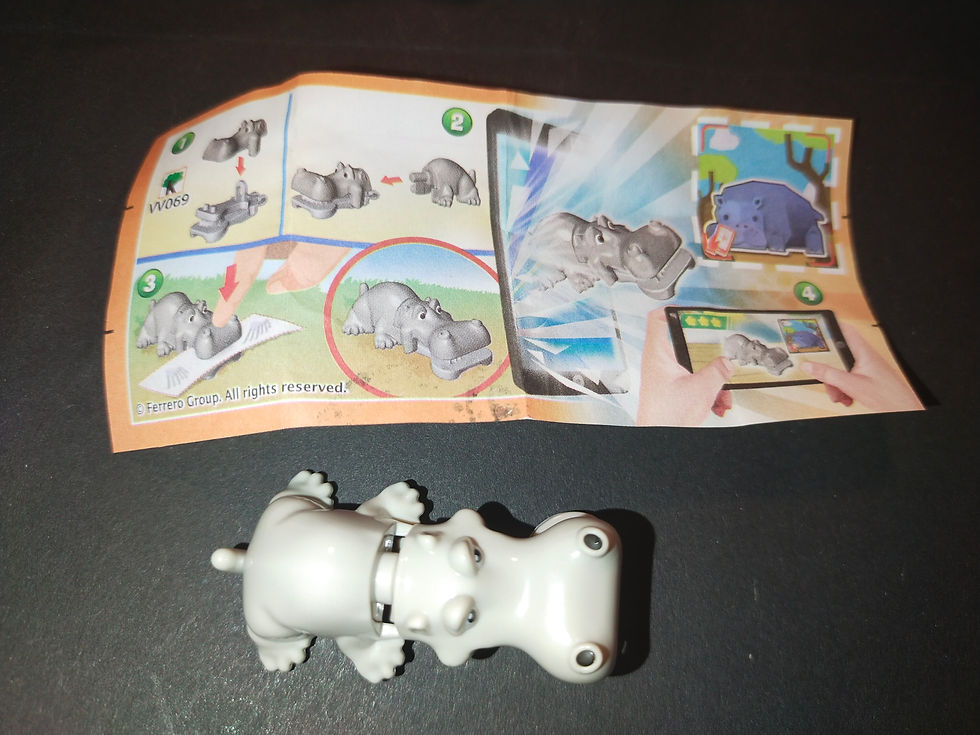 Šedý plastový hroch a návod k sestavení