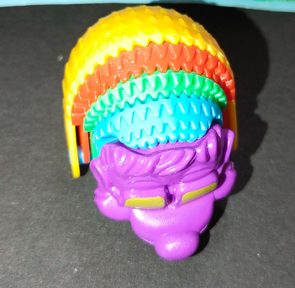 Miniatura: Barevná plastová hračka s vlasy
