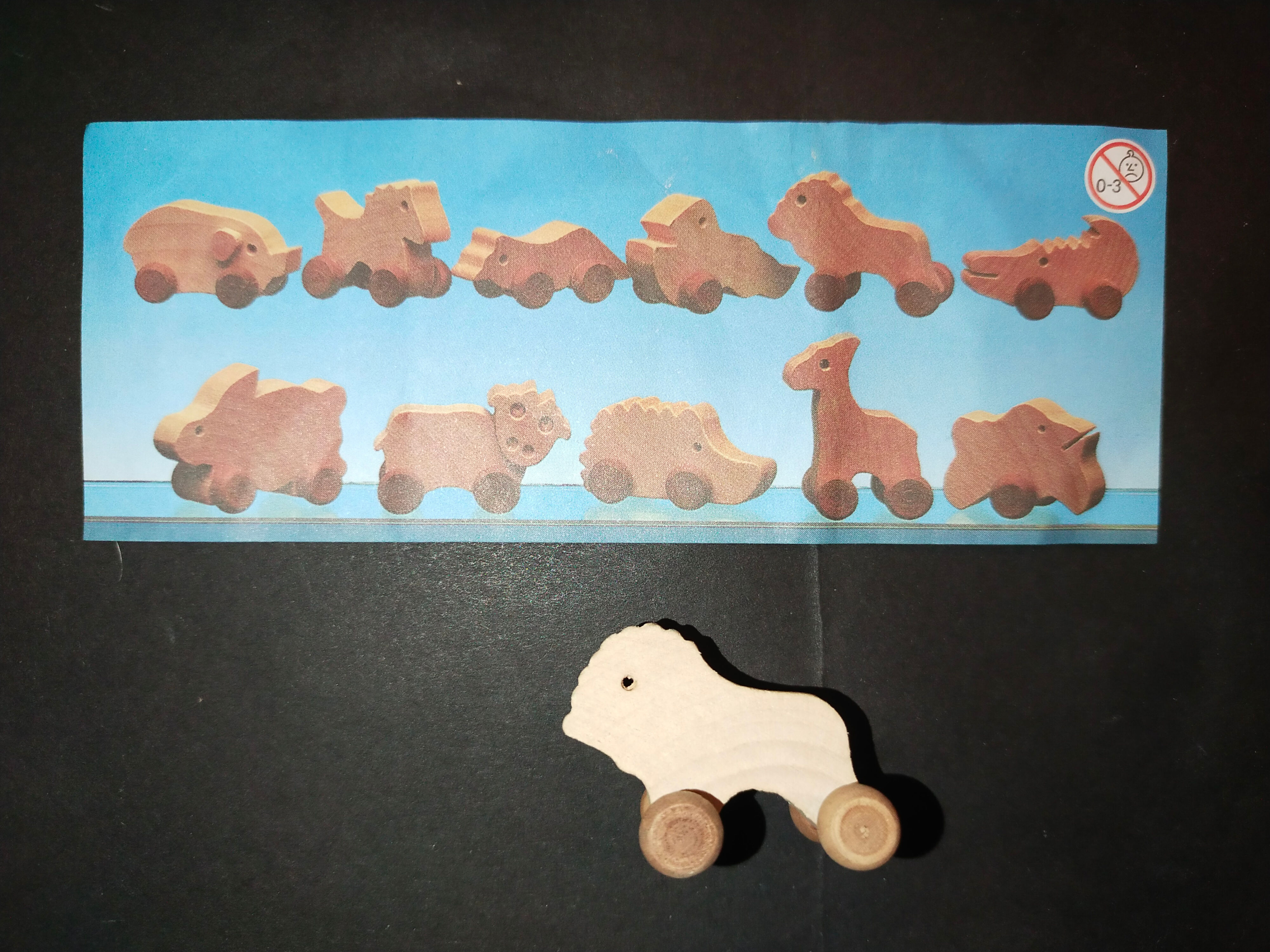 Dřevěná zvířátka na kolečkách, hračka