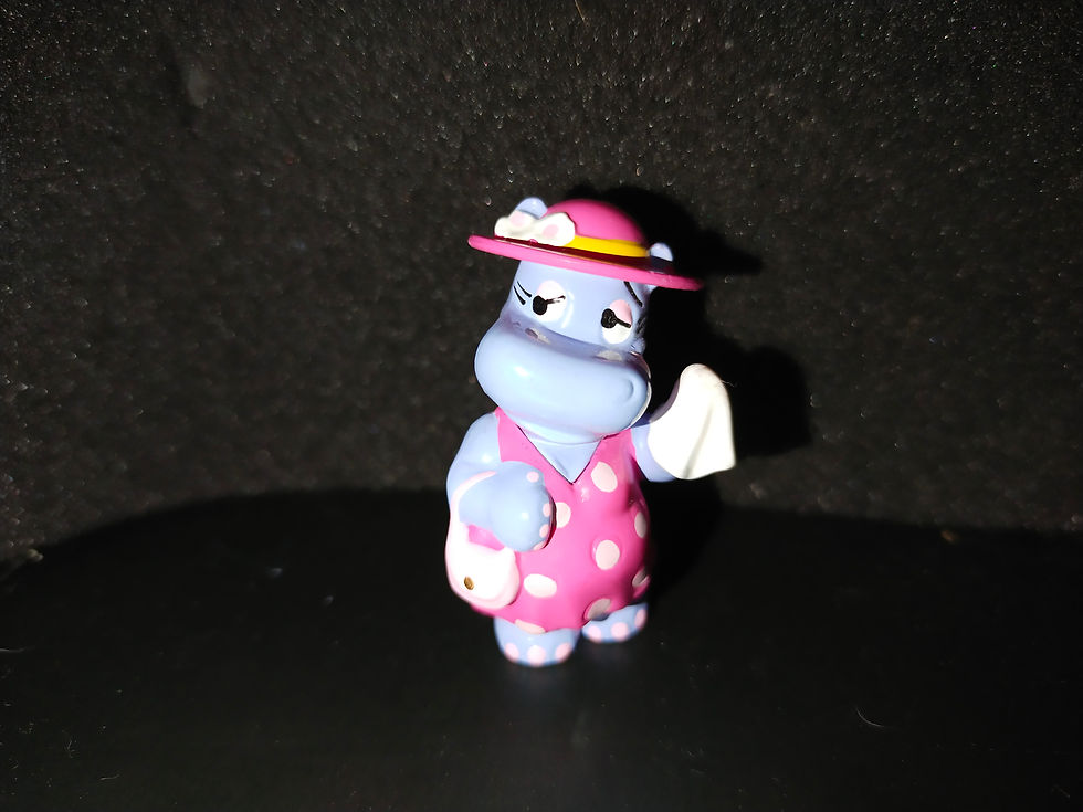 Roztomilá figurka hrošíka v růžových šatičkách