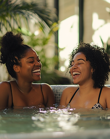 TJOIA Wellness Two women relaxing in a hot tub