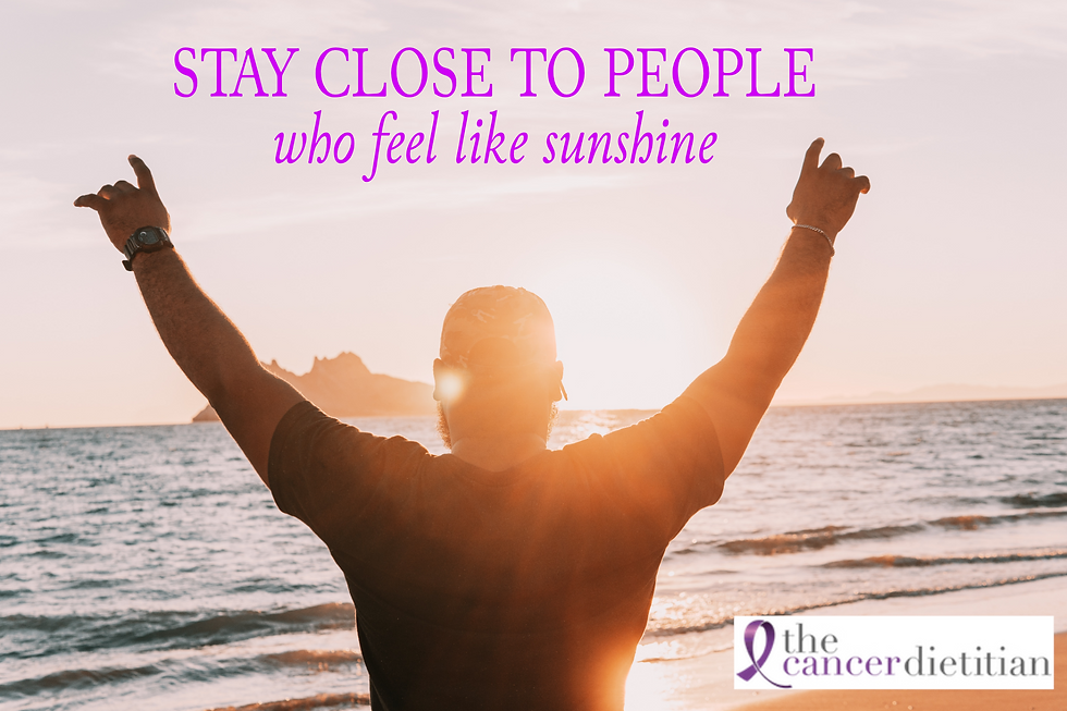 Man raising his arms towards the sun