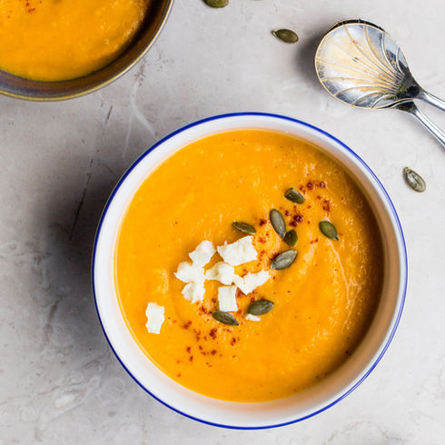 Nourishing bowl of soup on a table - a reminder that small, supportive meals can help during cancer treatment.
