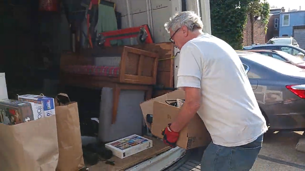 Image of a person removing commercial junk