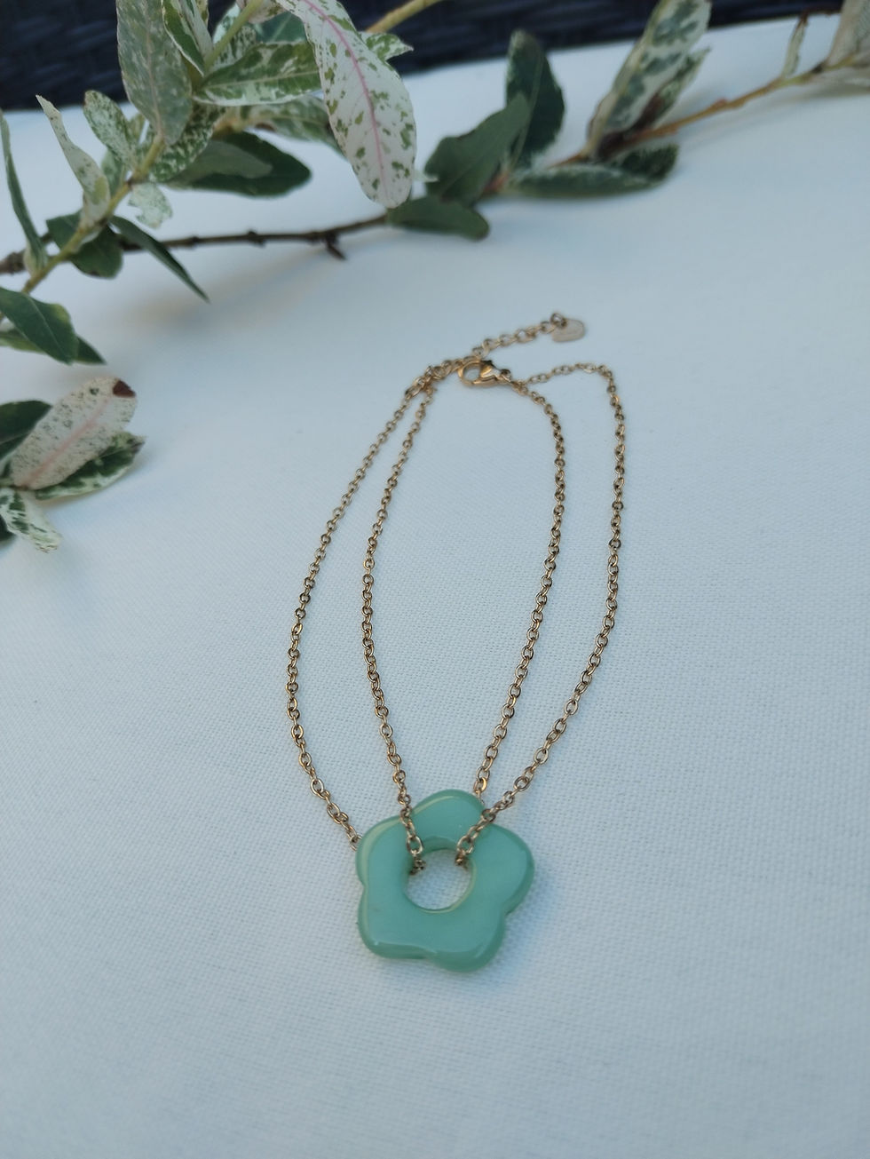Miniature : Chaine de cheville femme en acier avec fleur tendance