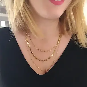 Collier triple rangs avec papillon