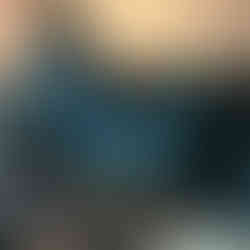 T-shape glass splashback reflecting the surroundings