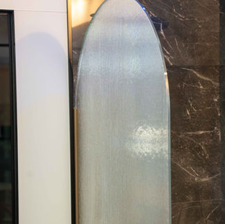 Medium fluted textured glass shower screen with gold profile.