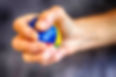 Stressball being squeezed
