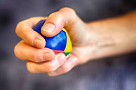 Stressball being squeezed