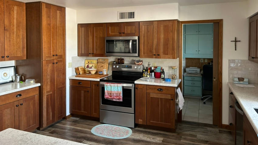 Full kitchen remodel sink wood cabinetry by ht construction