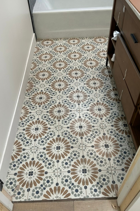 Bathroom flooring by ht construction