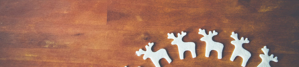White Reindeer on Wooden Surface