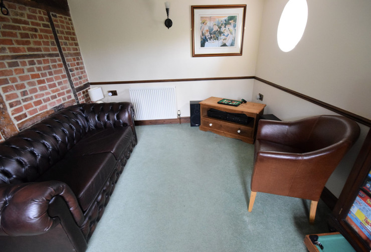 Front room with toy/games cupboard