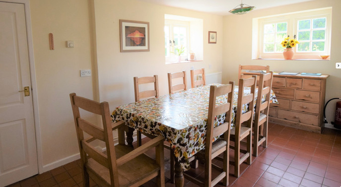 Large dining room with unique artwork