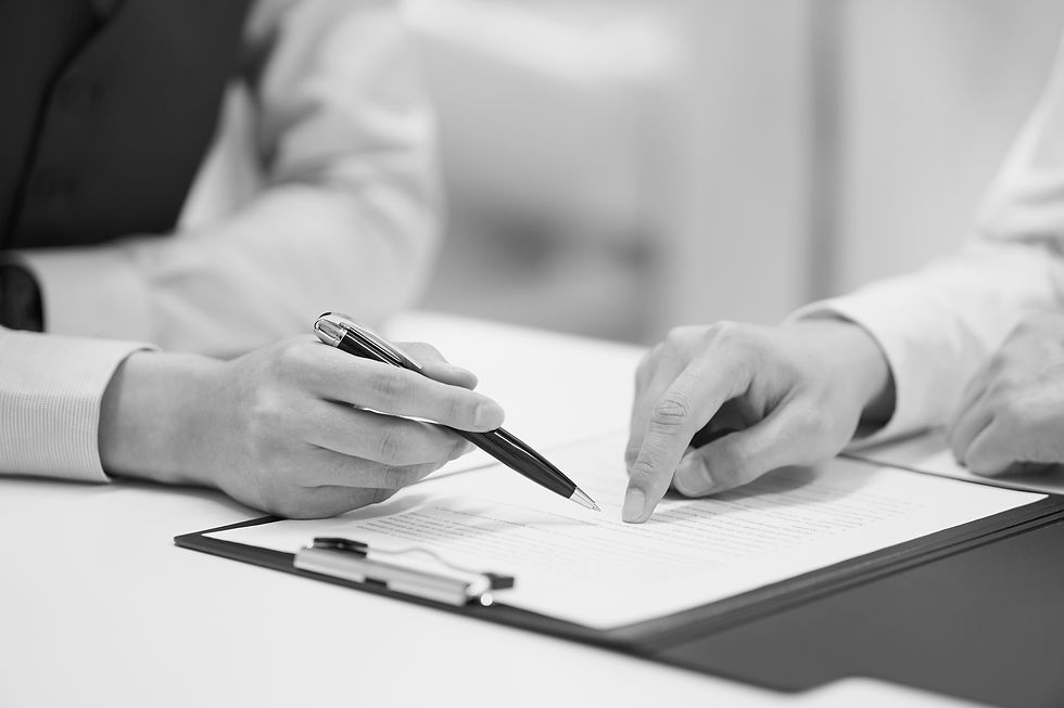 Pointing Pen And Finger On Document_edited.jpg