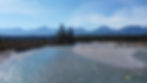 View drone image portfolio: scenic river and mountains.