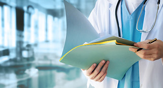 Doctor Reviewing Documents