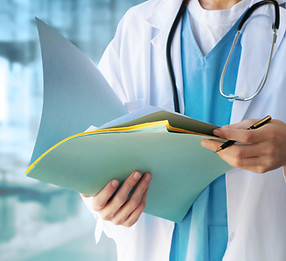 Medical Doctor looking at files