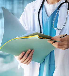 Doctor Reviewing Documents