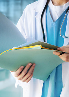 Doctor Reviewing Documents