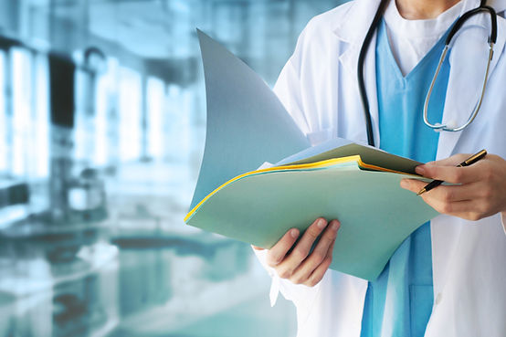 Doctor Reviewing Documents