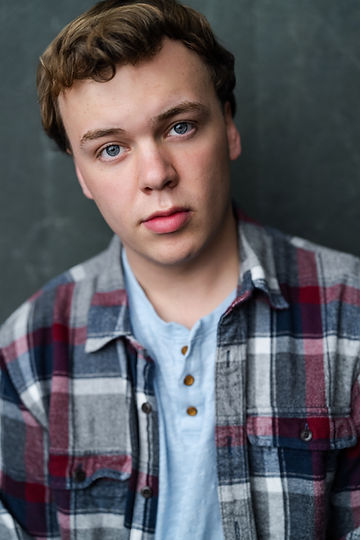 Brady McGuire Flannel Headshot