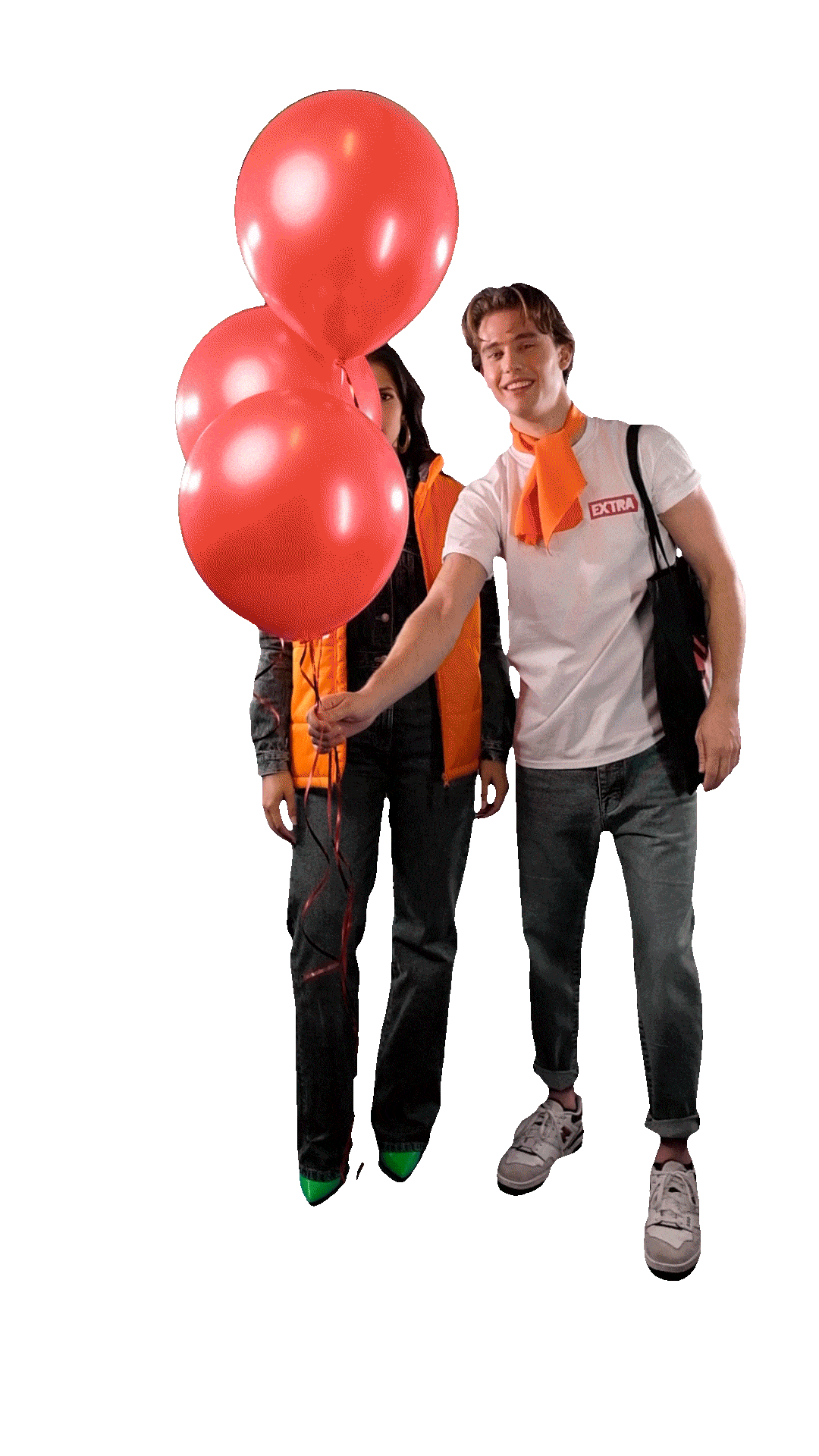 twee promotiemedewerkers in een gifje waarbij er een ballon wordt losgelaten en ze volledig gestyled zijn in de huisstijl van EXTRA