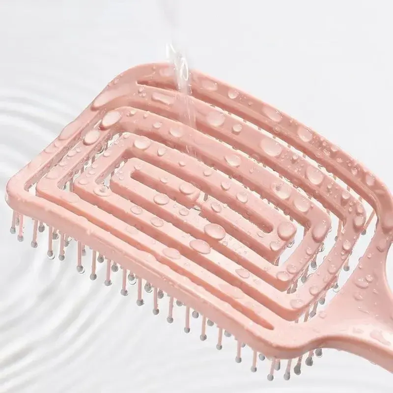 Thumbnail: Elastic Hollow Hair Brush with Scalp Massage for Styling and Detangling