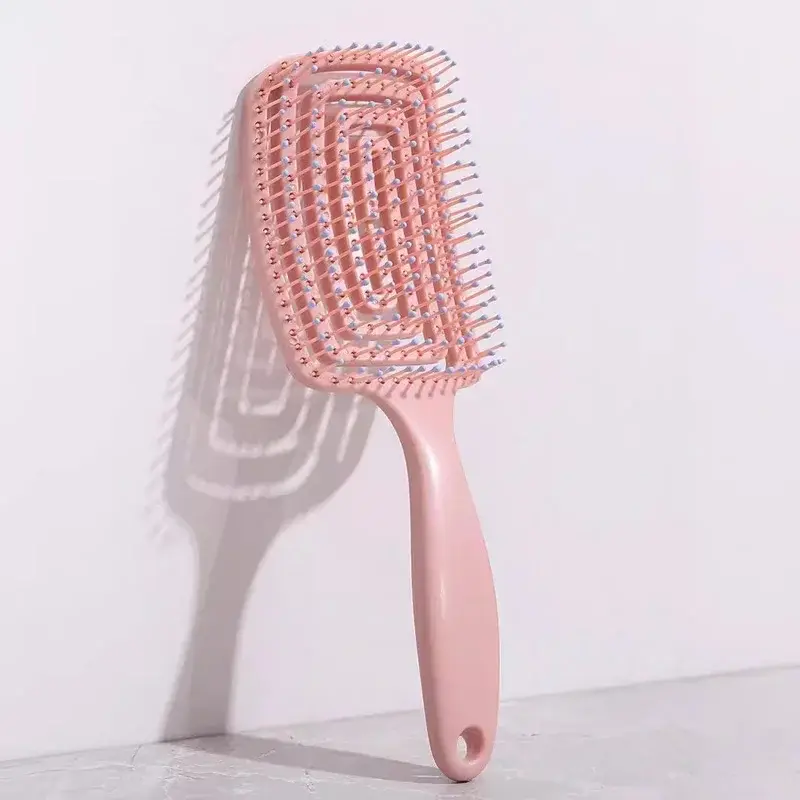 Thumbnail: Elastic Hollow Hair Brush with Scalp Massage for Styling and Detangling