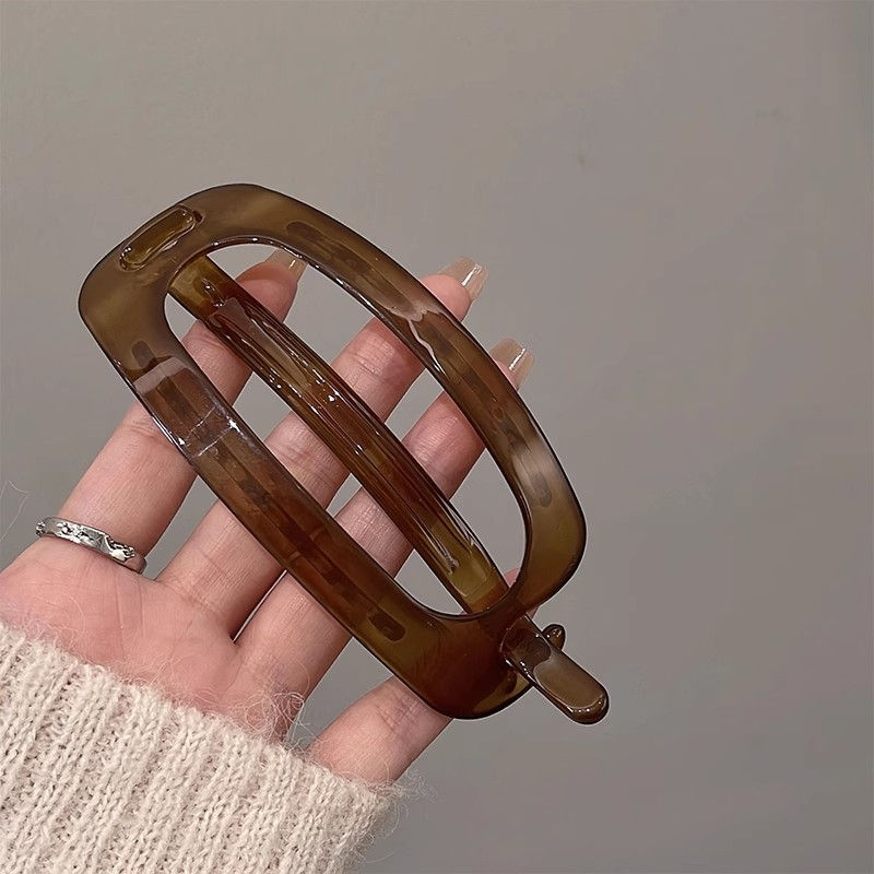 Thumbnail: Vintage Hollow Oval Twist Hair Clip – Solid Plastic Hairpin for Women
