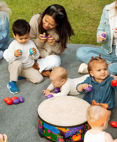 An outdoor jam session in a family music class