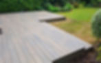Garden walkway using composite decking as elevated floor deck