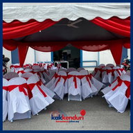 Kerusi banquet hitam dan meja panjang untuk event korporat JB