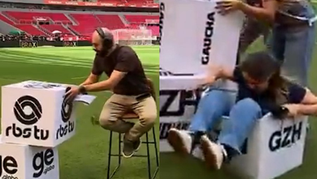 Repórter da Globo cai ao vivo durante ventania