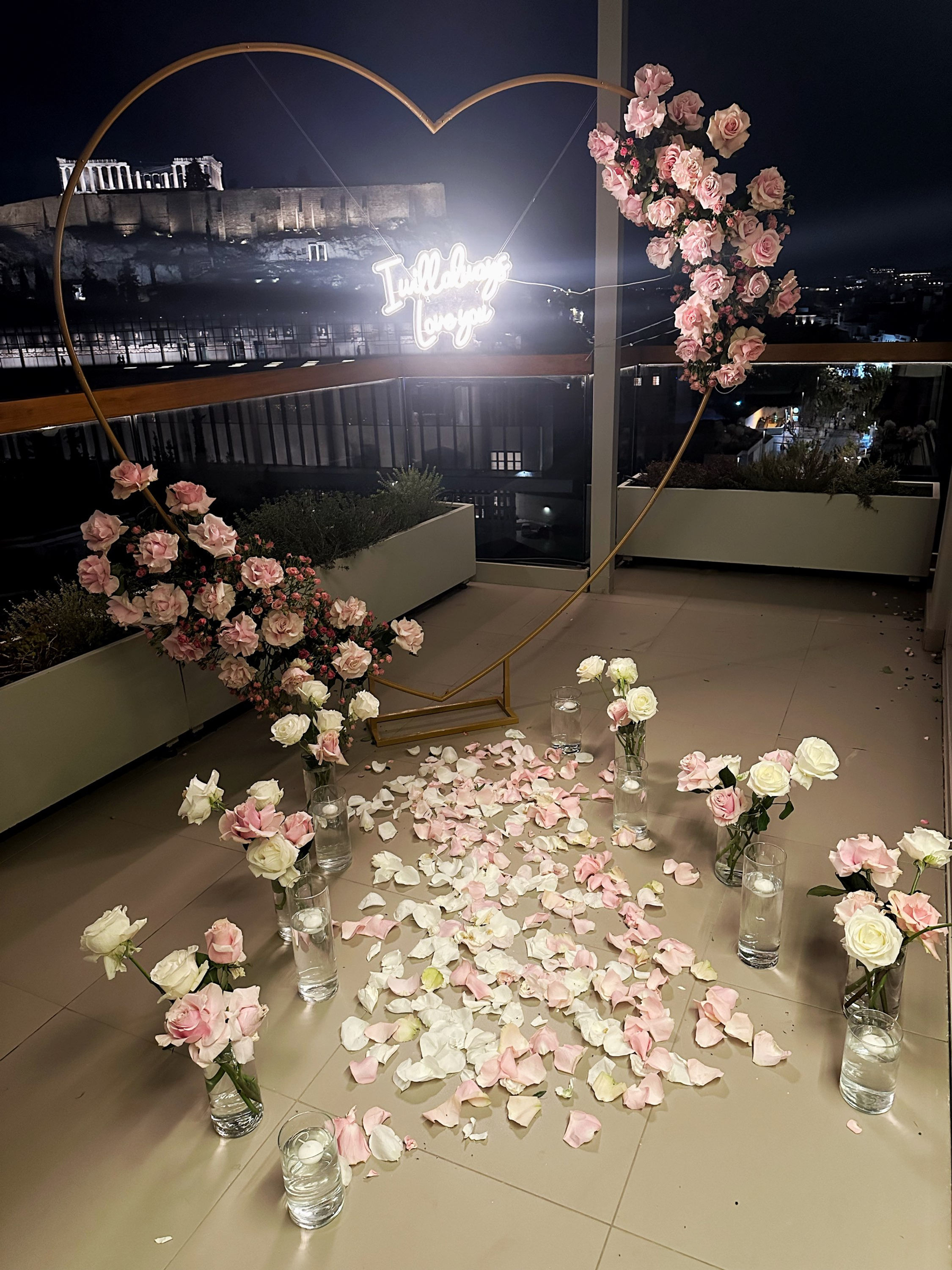 Marriage proposal with pink flowers