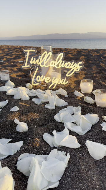 Thumbnail: Rose petals heart and aisle with candles  proposal 