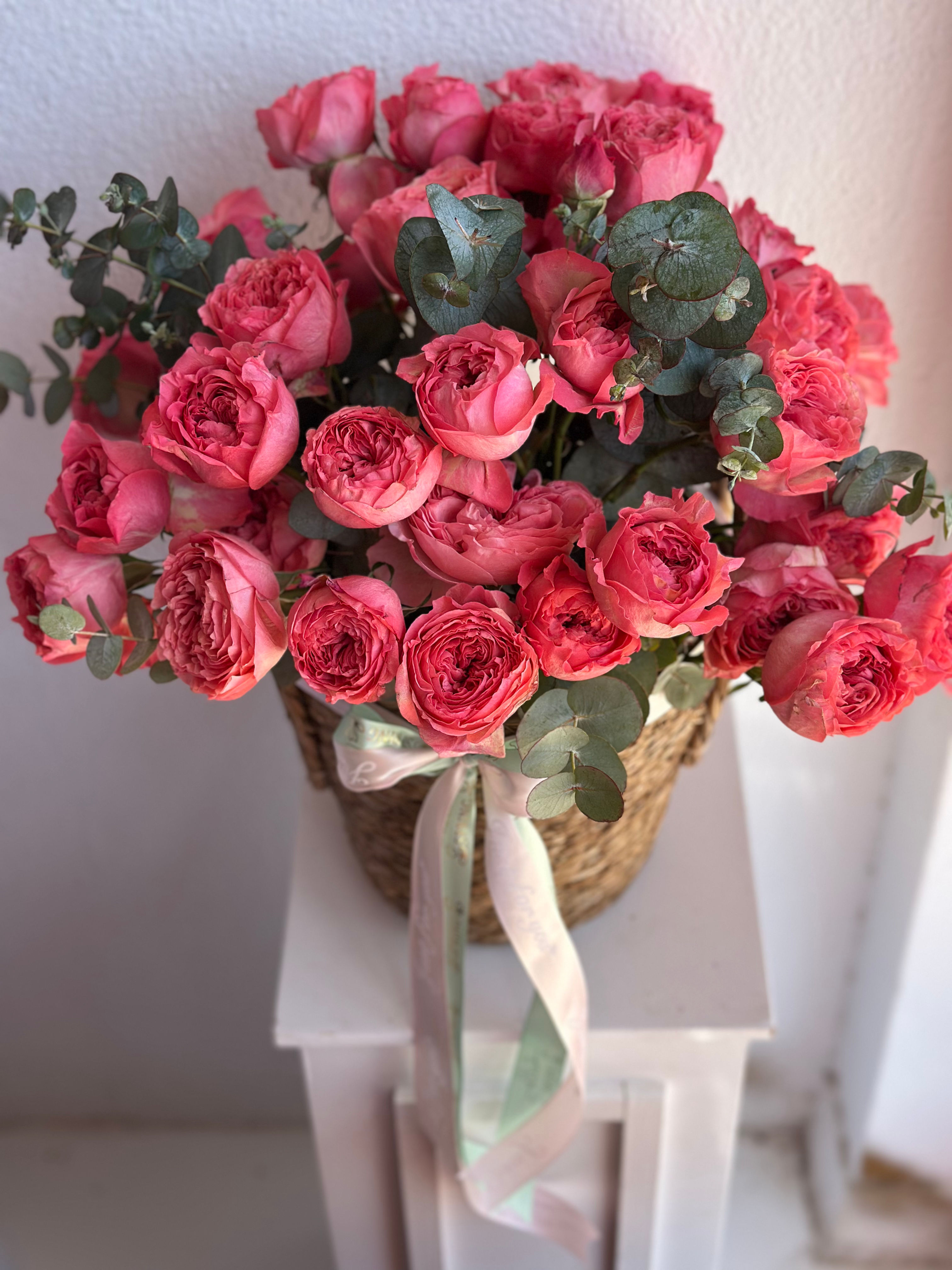 Wicker basket with garden spray roses 