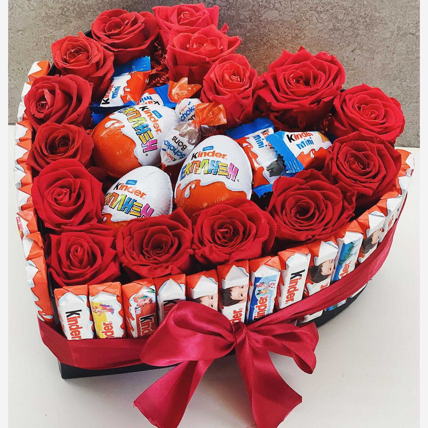 Fresh roses and Kinder surprise 