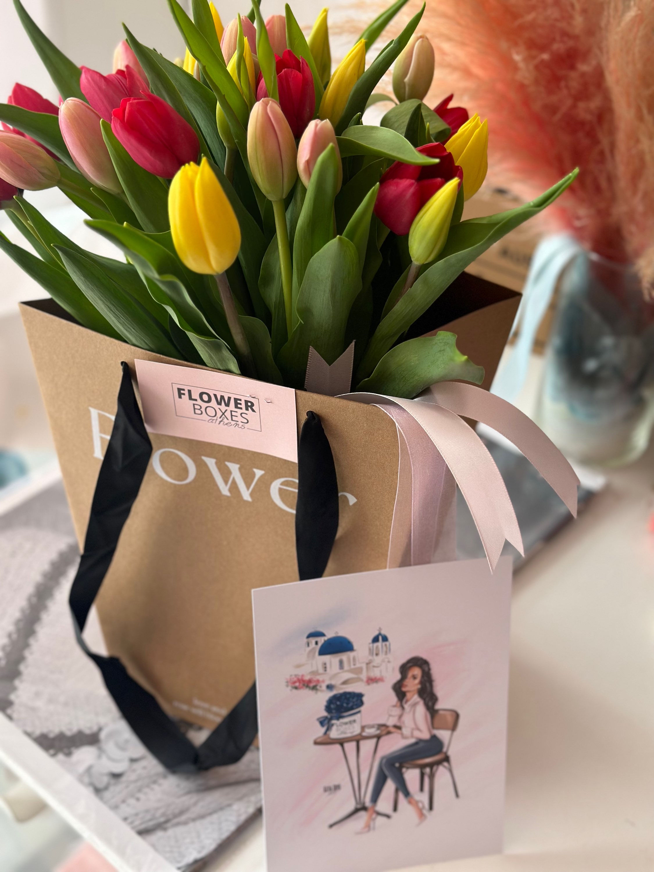 30 colourful tulips in aqua pack 