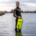 Man in wetsuit with buoy