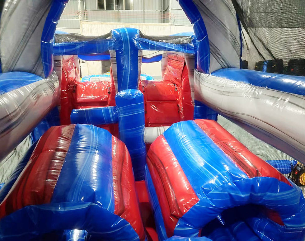 Thumbnail: Red white and blue long dual lane obstacle course rental